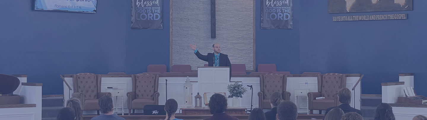 Pastor Lang preaching